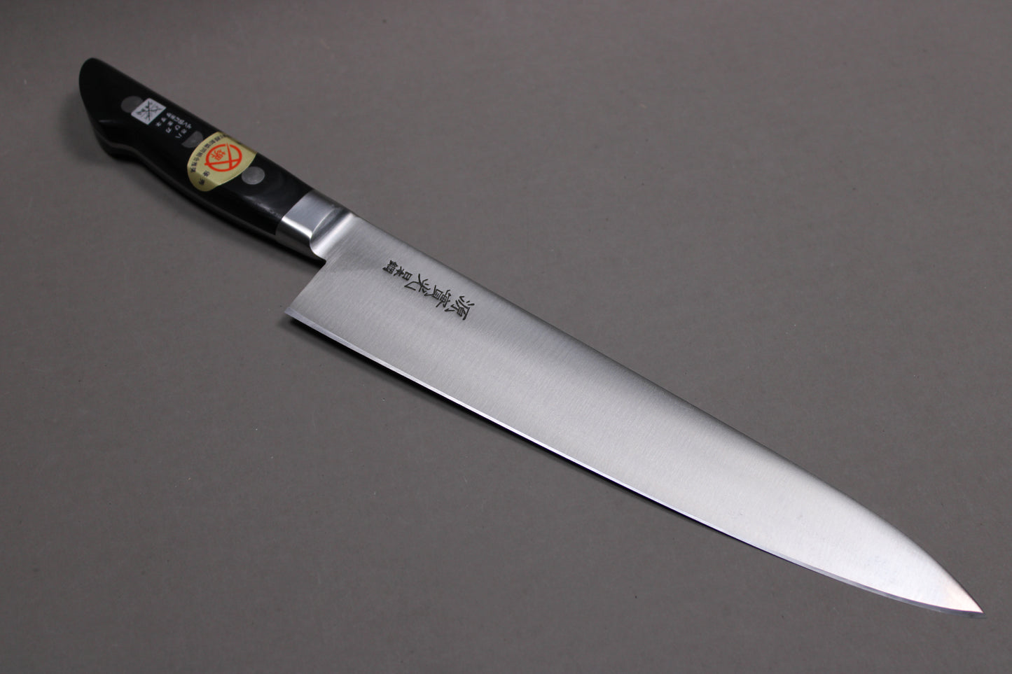 profile shot of jikko gyuto 240mm