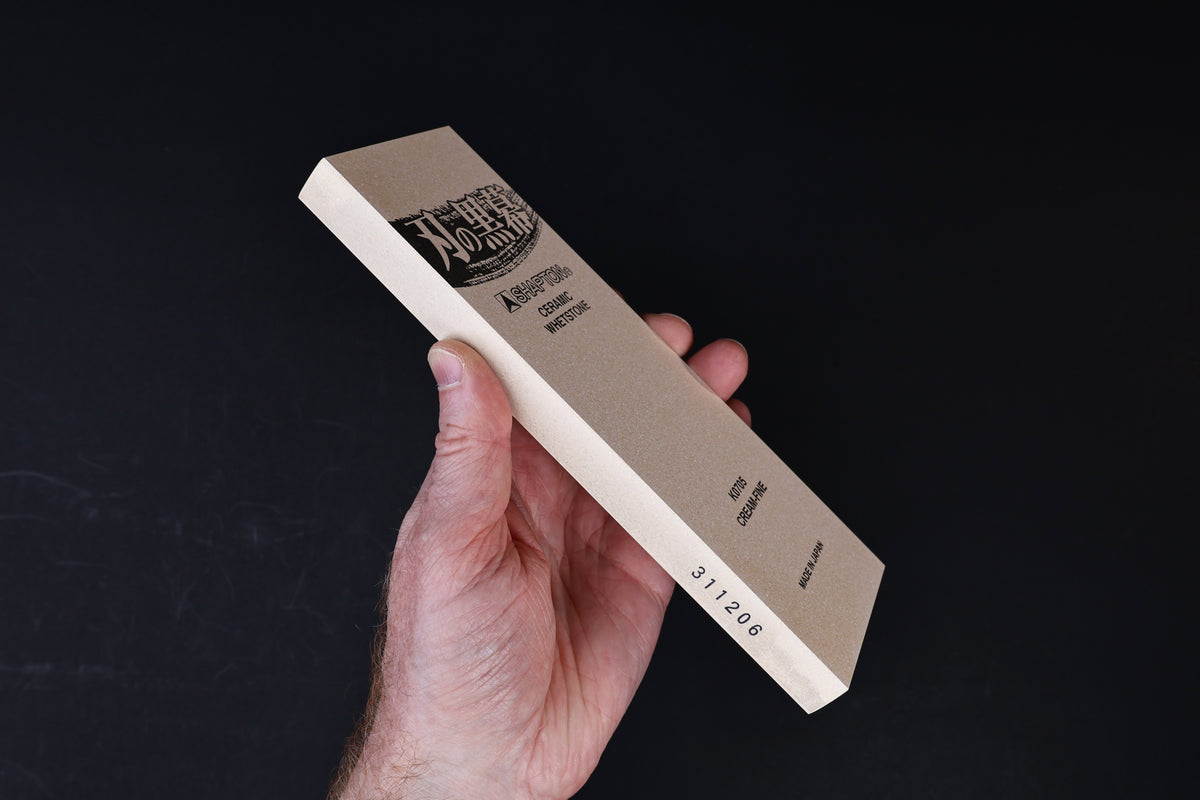 Shapton Kuromaku #12000 ceramic whetstone — side profile showing stone thickness and spine label