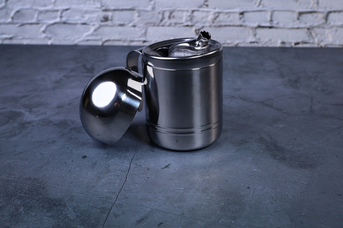 Stainless steel oil cruet small — front view lid removed showing inner spout detail and brushed steel body