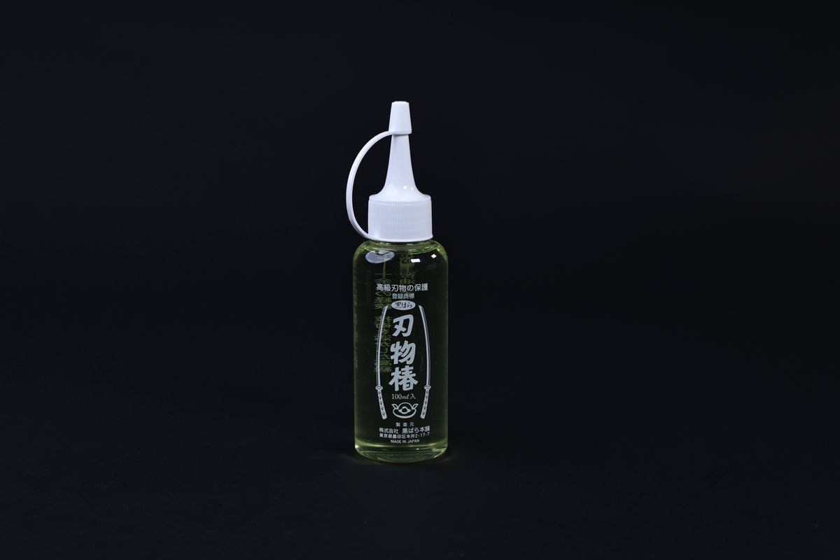 Tsubaki oil for knives and iron pans 100ml — full upright view of bottle, label, and precision applicator tip