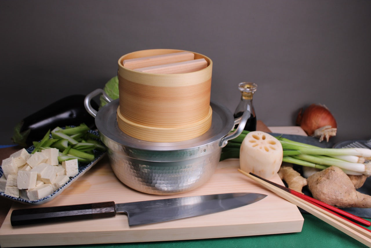 hinoki wood tofu maker two handed aluminum dantsuki pot on cutting board with japanese knife chopstick and vegetables