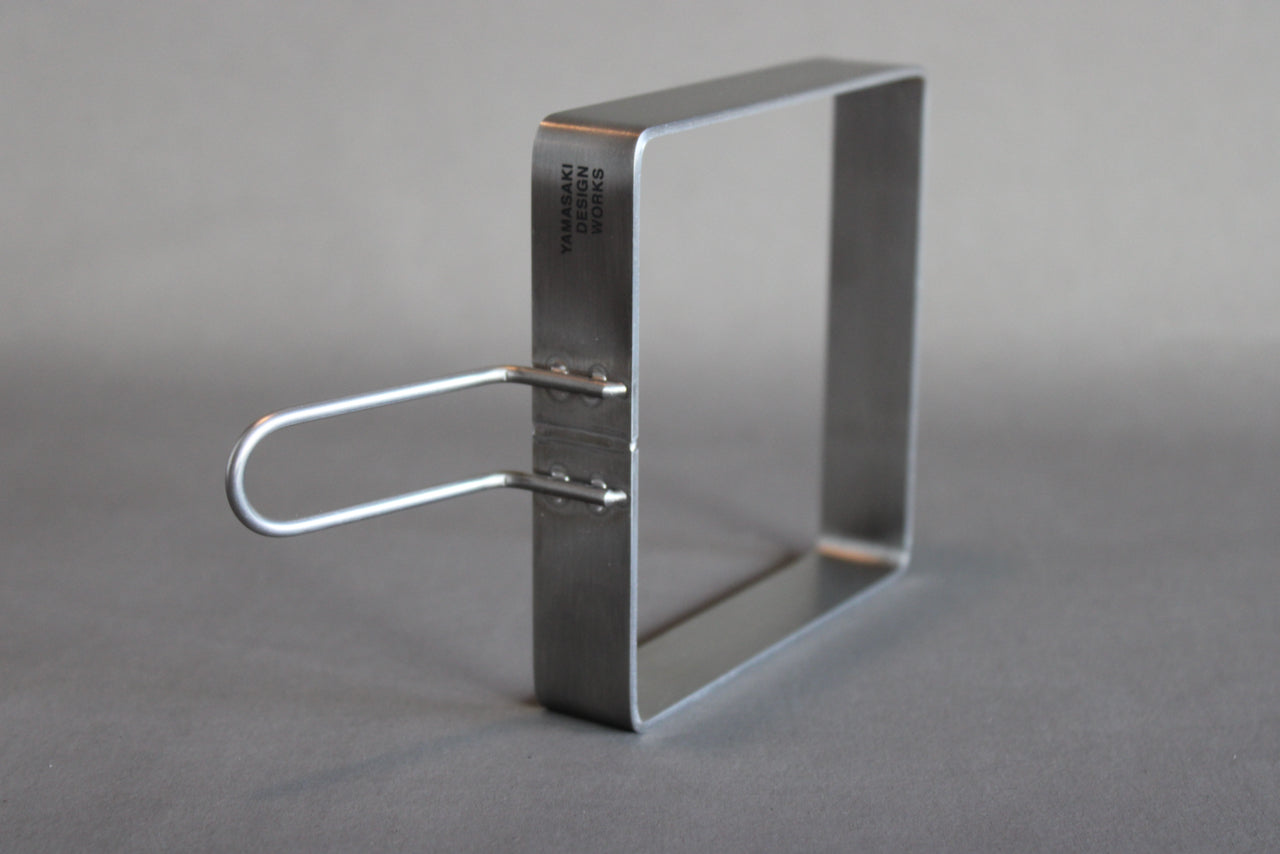metal guide for making sando showing side silver in color