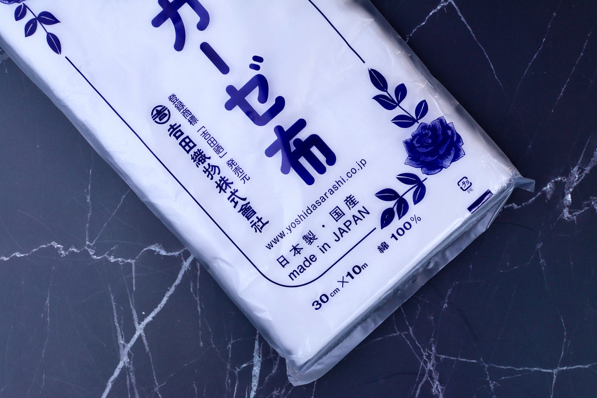 Yoshida Sarashi kitchen gauze — close-up of Japanese packaging showing Made in Japan, 100% cotton, and dimensions