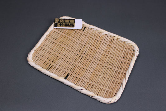 bamboo weaved hand made in Sado island Japan high quality Haru plate light tan color whitish edges grey background
