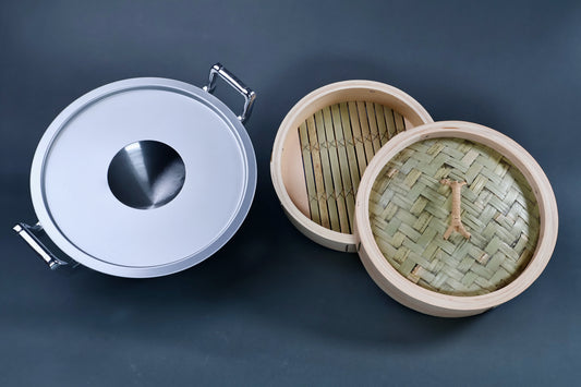 Bamboo steamer kit 21cm components overhead showing aluminum collar, cedar steamer body with green bamboo slat base and woven bamboo lid