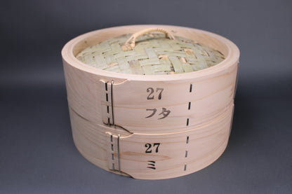  profile shot bamboo steamer twenty seven cm kiso hinoki base and lid extra thick frame katakana print and number twenty seven on body with grey background