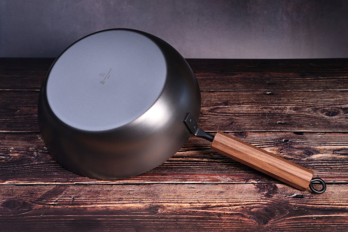 Carbon Steel Nitride deep fry pan 26cm tipped showing exterior bottom with maker&