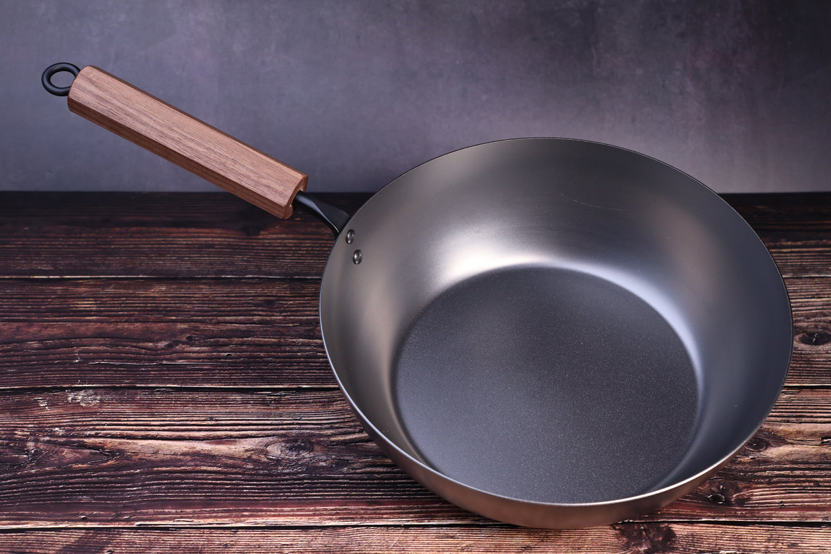 Carbon Steel Nitride deep fry pan 26cm close front view showing smooth dark interior and walnut handle
