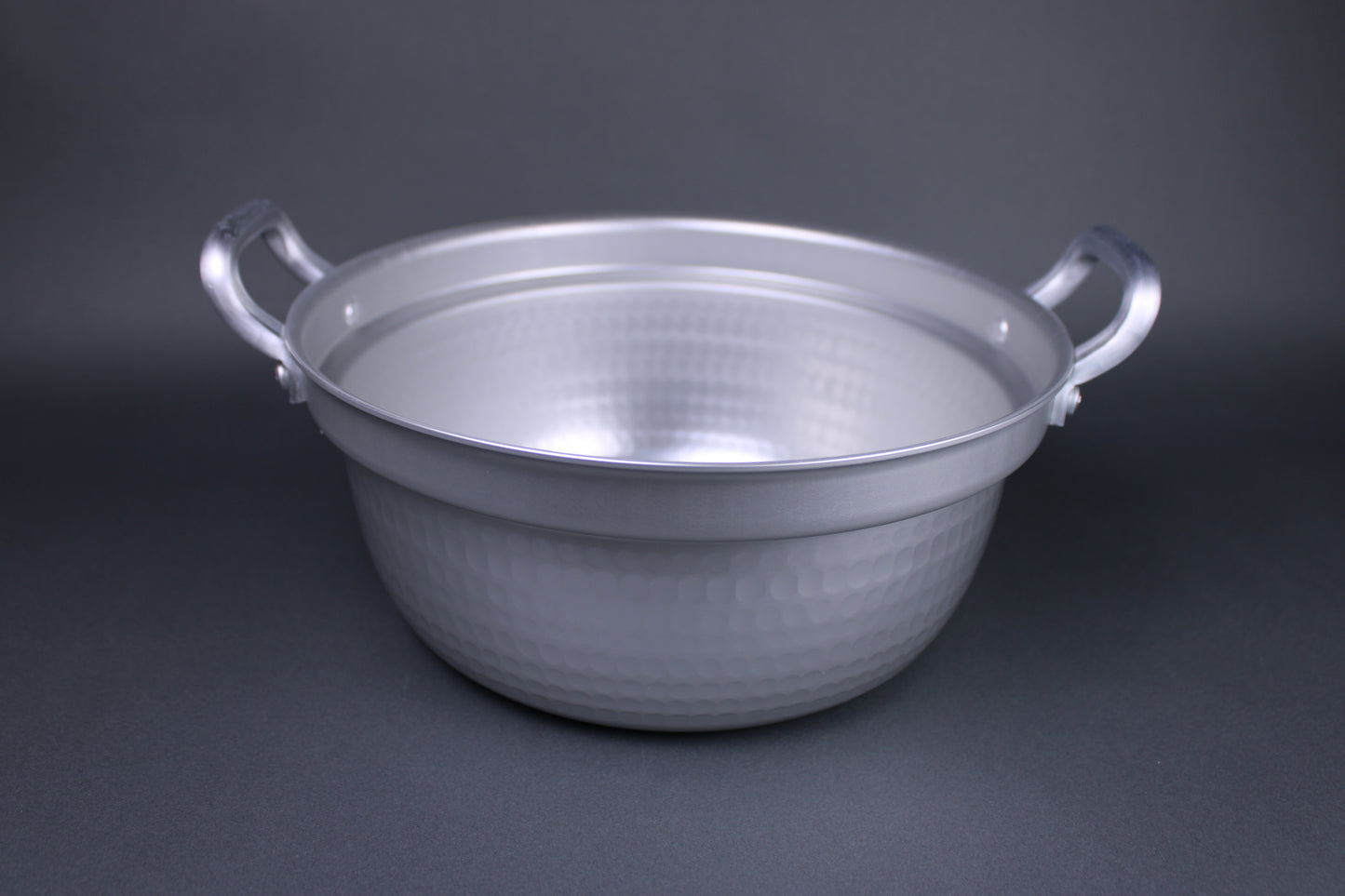  profile shot dantsuki steaming pot two handles with internal ledge for holding steaming basket twenty one centimeters aluminum made in japan 
