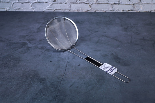 Fine mesh skimmer — full view showing fine wire mesh basket, stainless rim, and Japanese product label