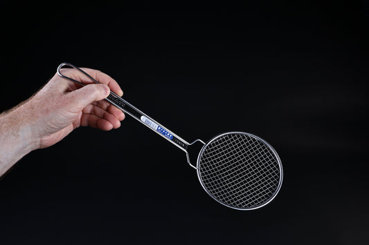 Fujiboshi fried food skimmer — face-on view of wire grid basket and long stainless handle held in hand