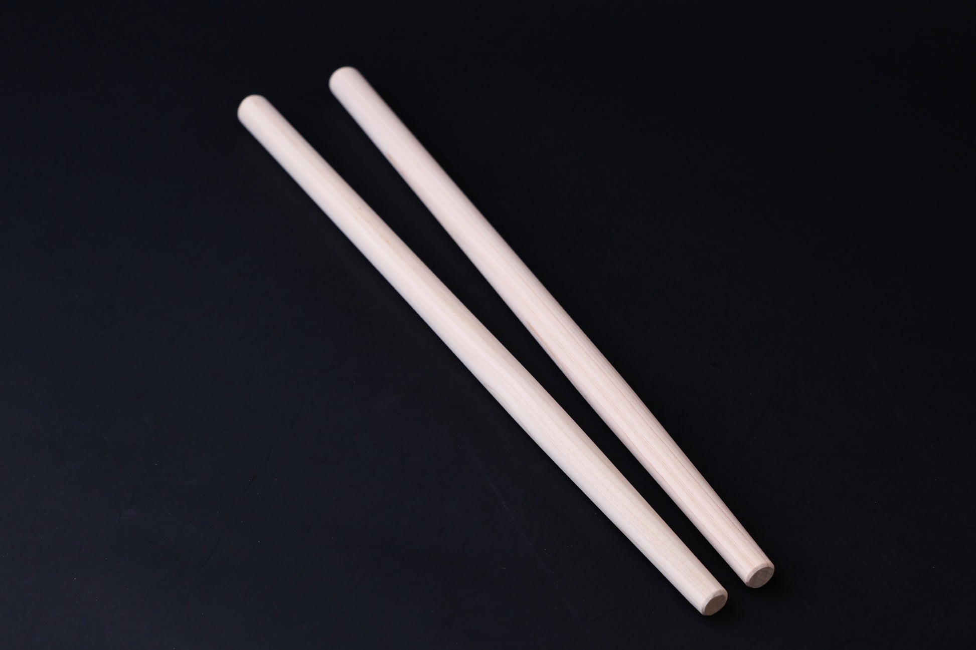 Hanabashi tempura chopsticks 36cm — overhead view showing natural unfinished hinoki wood color and taper
