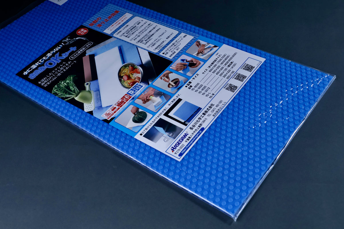 Hasegawa non-slip mat blue dotted surface texture detail showing waterproof grip pattern