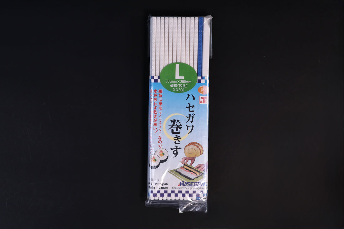 Hasegawa white antibacterial sushi rolling mat size L shown front side out on a dark background