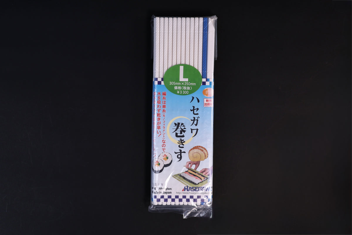 Hasegawa white antibacterial sushi rolling mat size L shown front side out on a dark background