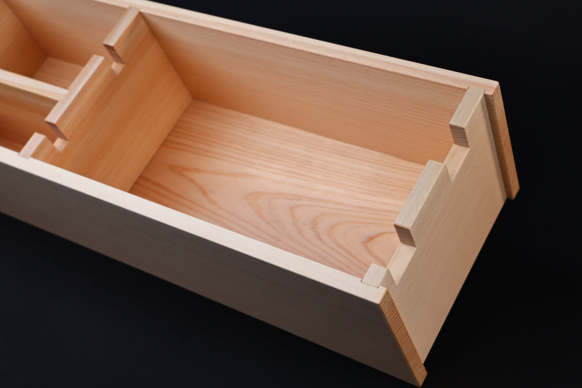 Hinoki knife stand box — close-up of end corner showing finger joint construction and hinoki grain