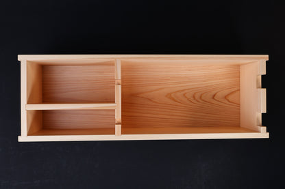 Hinoki knife stand box — overhead view of interior showing compartment layout and hinoki wood grain