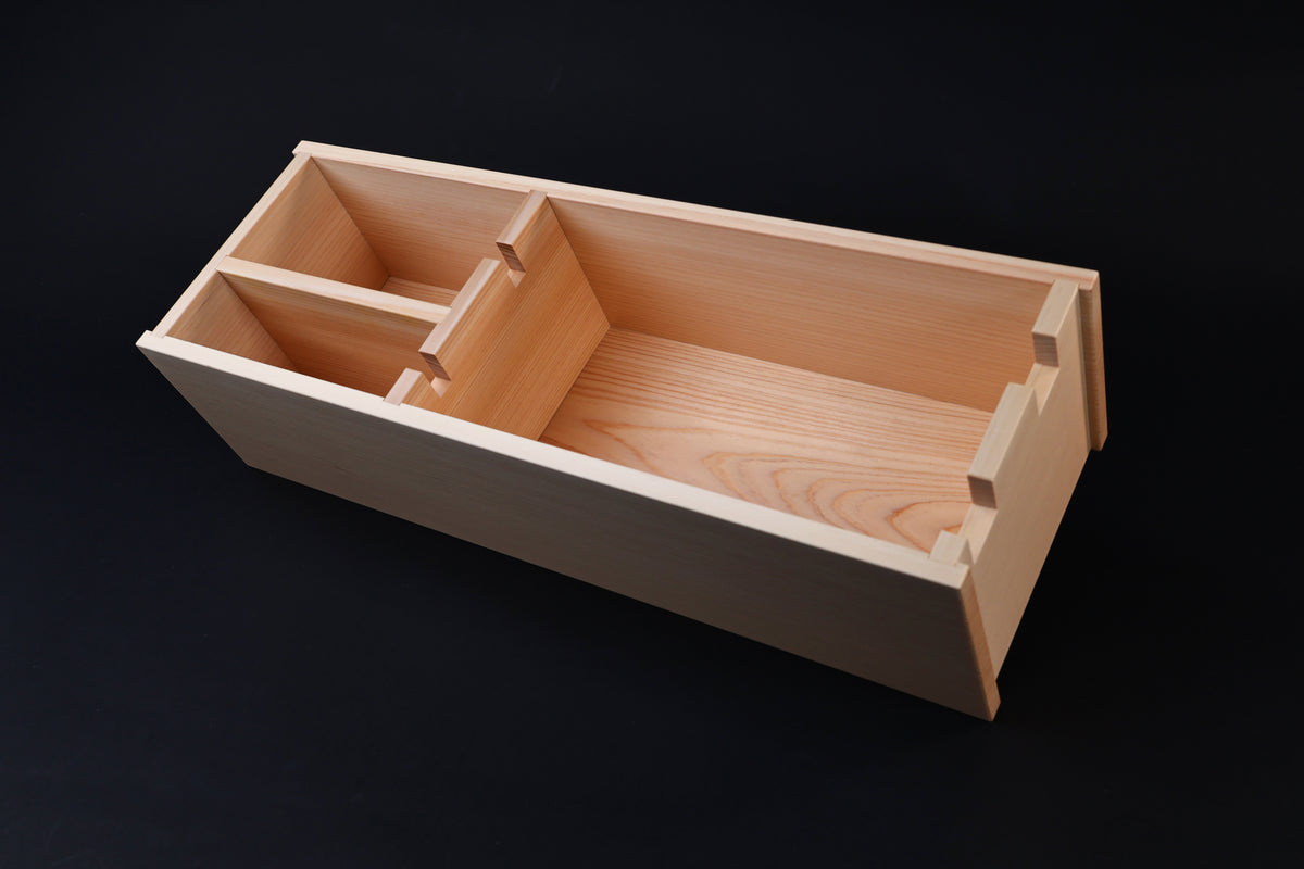 Hinoki knife stand box — diagonal view of open interior showing hinoki wood construction and divider joinery