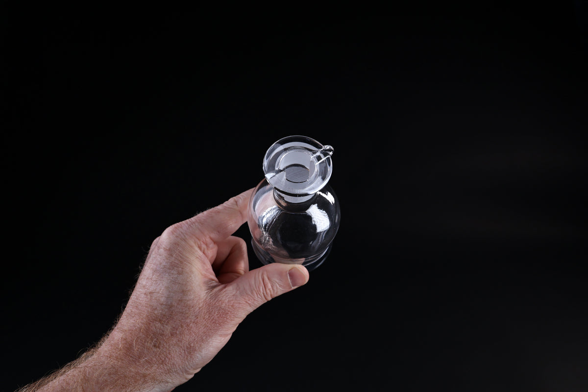Hirota Glass soy sauce cruet — bottom view showing thick glass base construction
