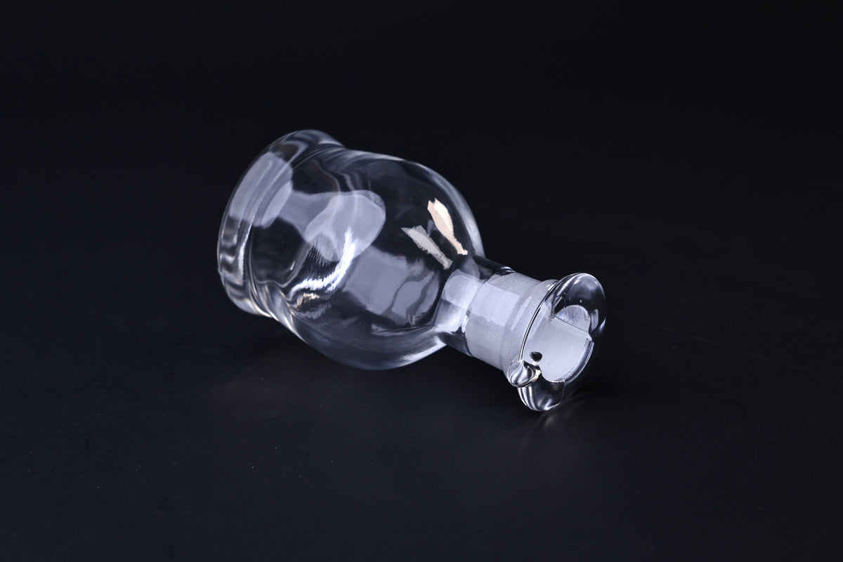 Hirota Glass soy sauce cruet — angled view showing rounded body form and stopper detail
