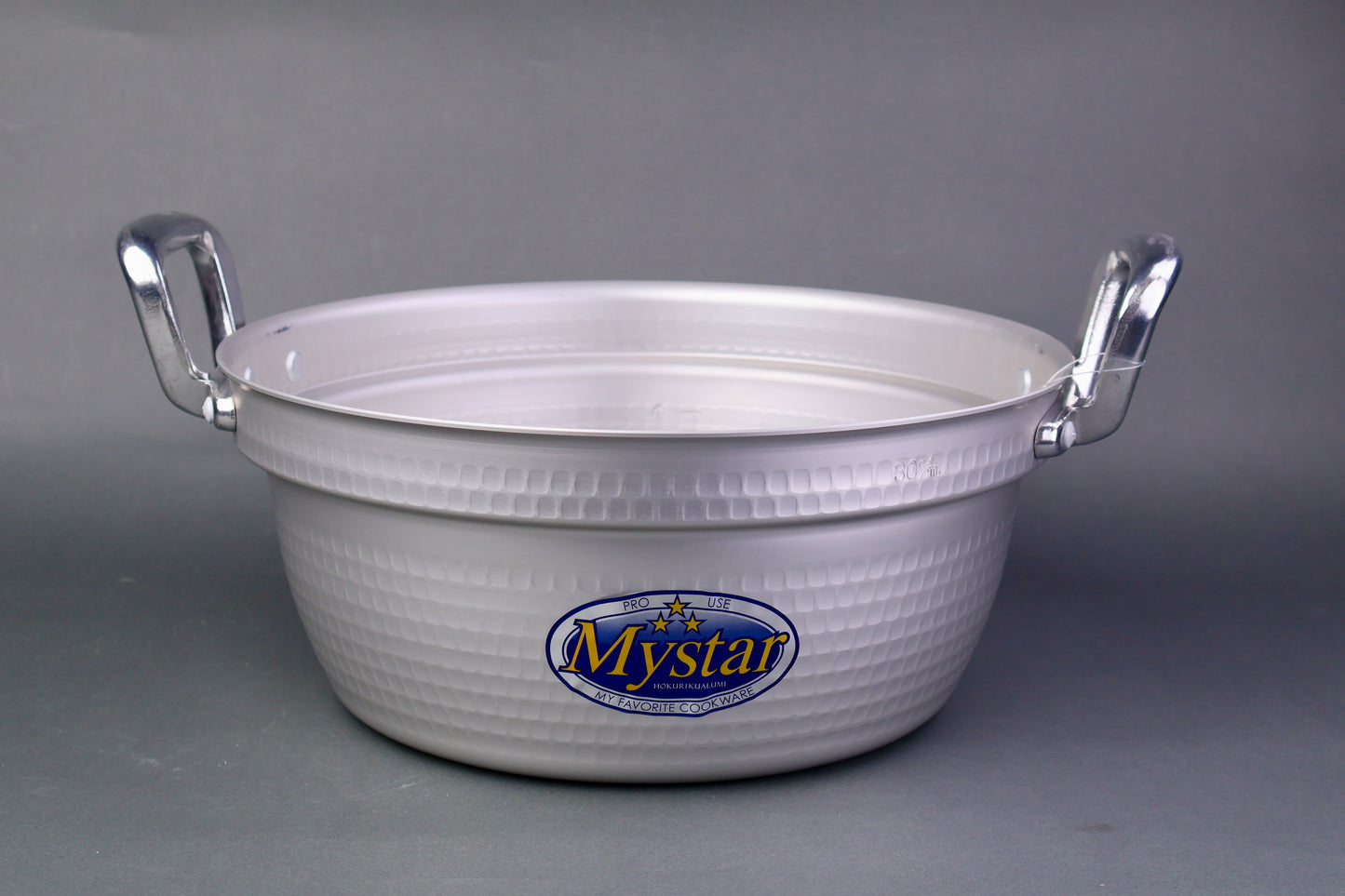 two handled silver grey cooking pot for steamed food with sticker on pot face in grey backdrop