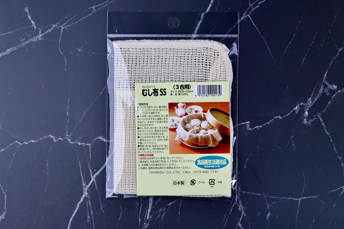 Ishimizu steamer cloth SS 25x25cm in packaging, front label fully visible against marble background