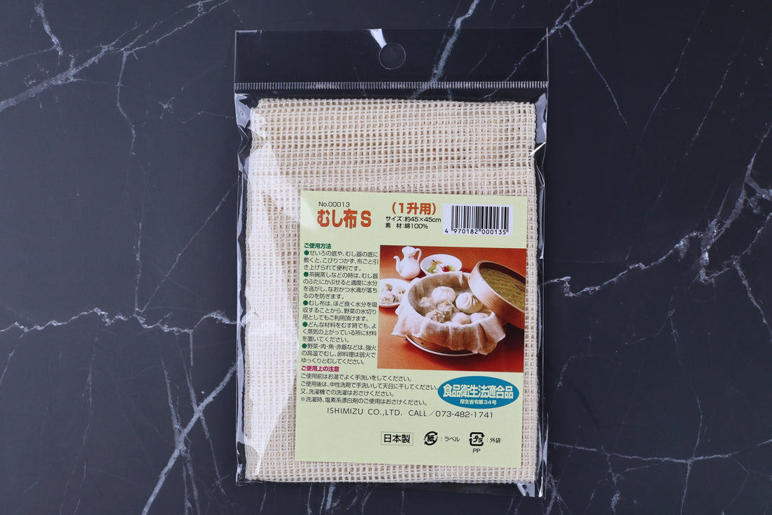 Ishimizu steamer cloth 45x45cm in packaging, front label fully visible against marble background