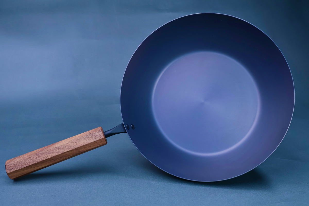 Japanese carbon steel nitride deep fry pan 24cm front view showing smooth nitrided interior and octagonal hardwood handle