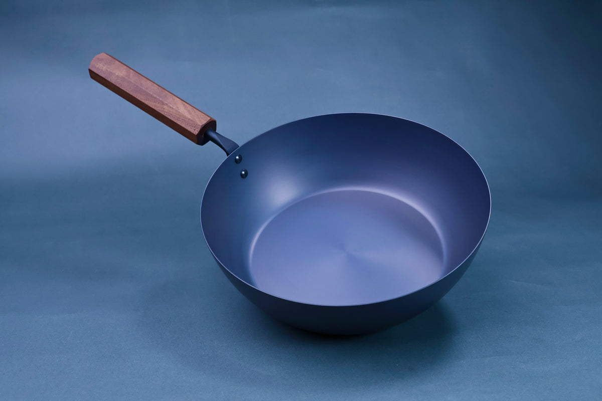 Japanese carbon steel nitride deep fry pan 24cm with octagonal hardwood handle, side profile showing deep bowl