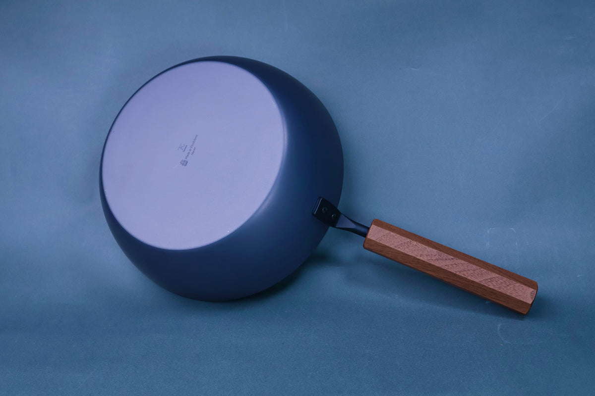 Underside of Japanese carbon steel nitride deep fry pan 24cm showing maker&