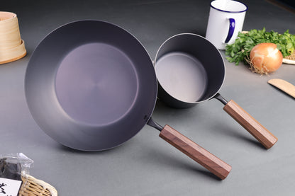 iron tanabe pans nitrided with octagonal wood handles and great background