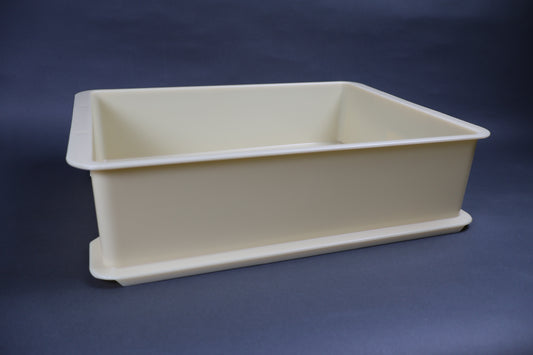yellowish tan rectangular knife sharpening box from Japan short height sturdy grey background