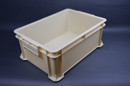 tall tannish yellow sharpening box for kitchen knife maintenance and sharpening rectangular shape grey background