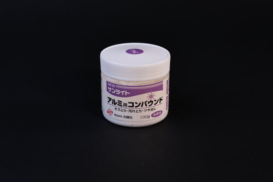 Koyo New Sunlite aluminum polishing compound 100g jar with purple label shown front-on against a dark background