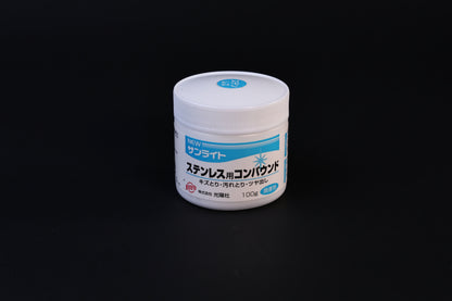 Koyo New Sunlite stainless steel polishing compound 100g jar with blue label shown front-on against a dark background