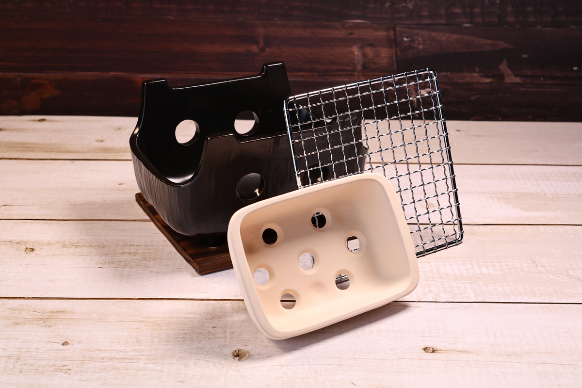 Misuzu Pottery Banko Yaki Konro Grill Small — disassembled showing ceramic body, ash catcher, and wire grate