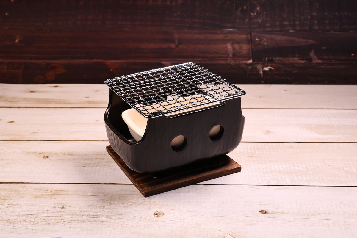 Misuzu Pottery Banko Yaki Konro Grill Small — slight angle view showing grate, ash catcher, and ceramic profile