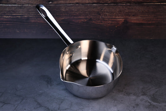 Mt. Fuji Steel Clad Yukihira saucepan 16cm on black marble showing interior, pour spouts, and full handle