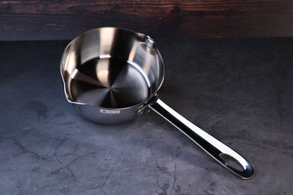 Mt. Fuji Steel Clad Yukihira saucepan 16cm held in hand showing exterior profile and brand label