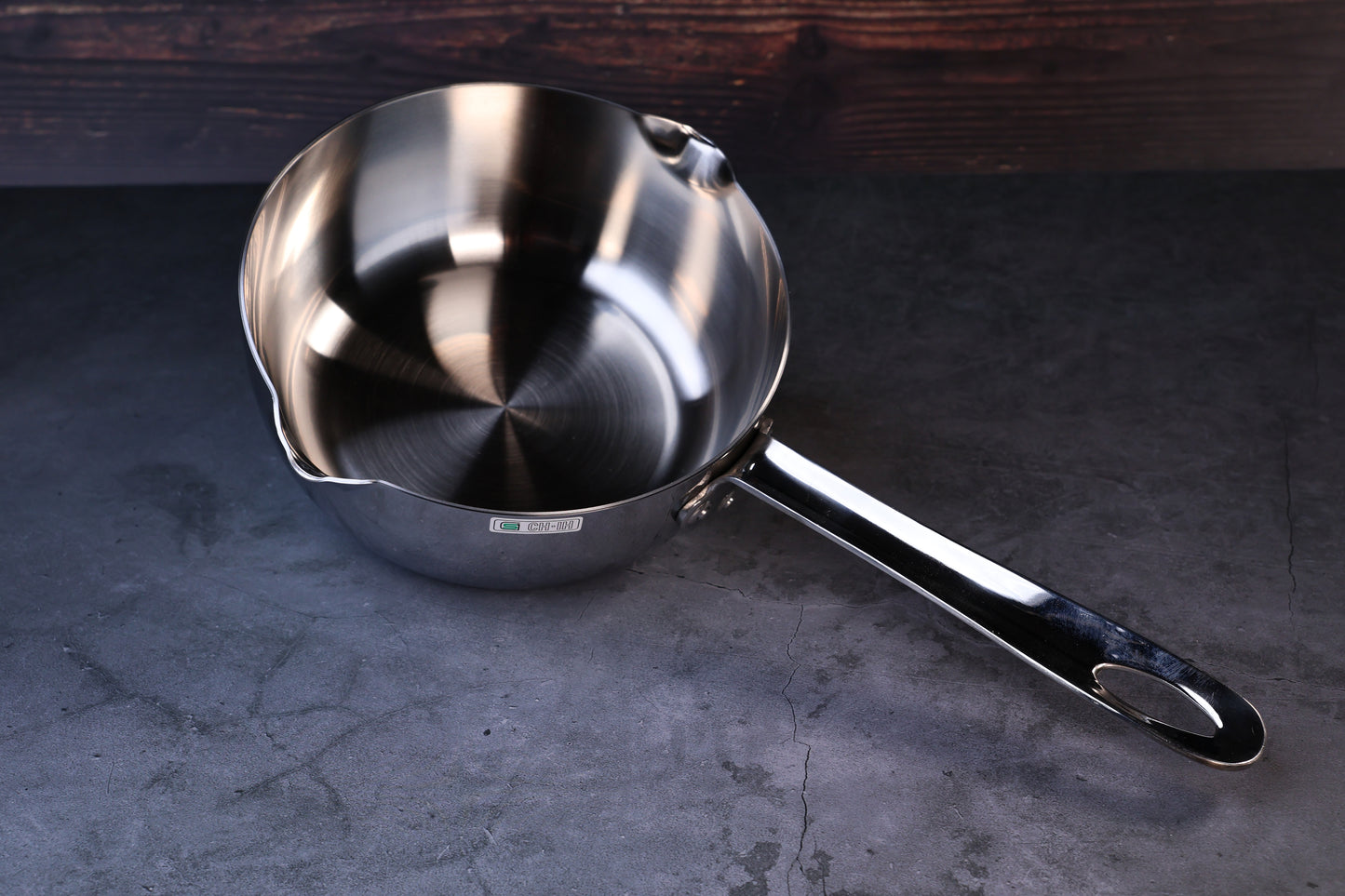 Mt. Fuji Steel Clad Yukihira saucepan 18cm angled view showing interior, loop handle, and brand label