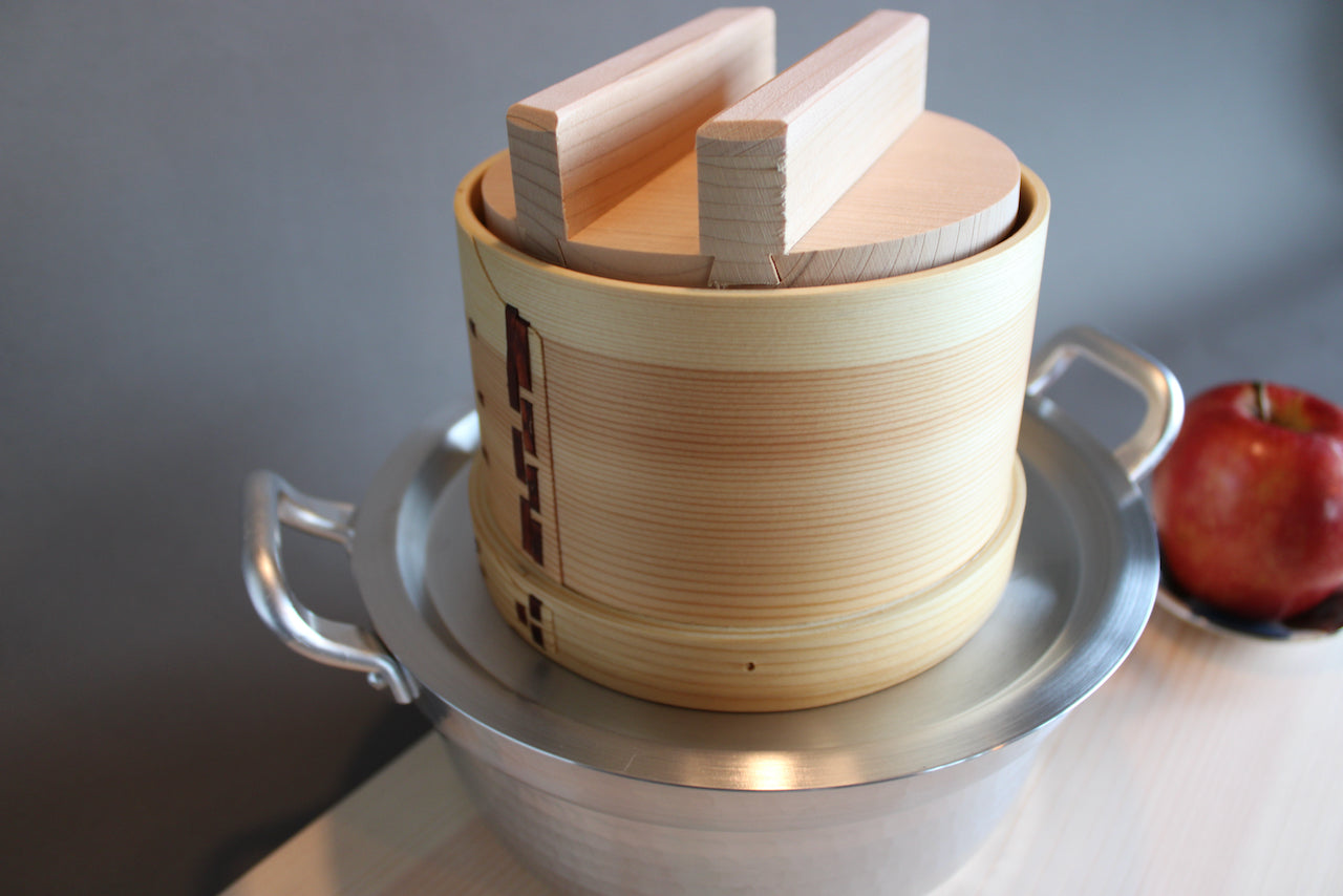 hinoki wood seiro tofu maker atop steam ring and nimono pot japanese cookware