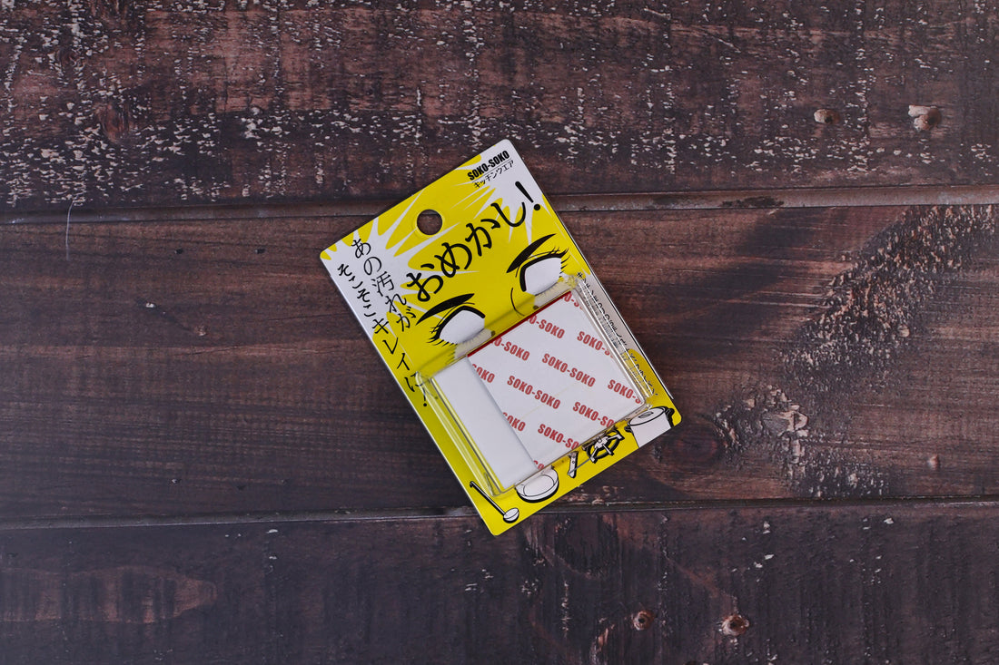 Naniwa Soko-Soko rust eraser — front of yellow Japanese retail packaging flat lay on wood surface