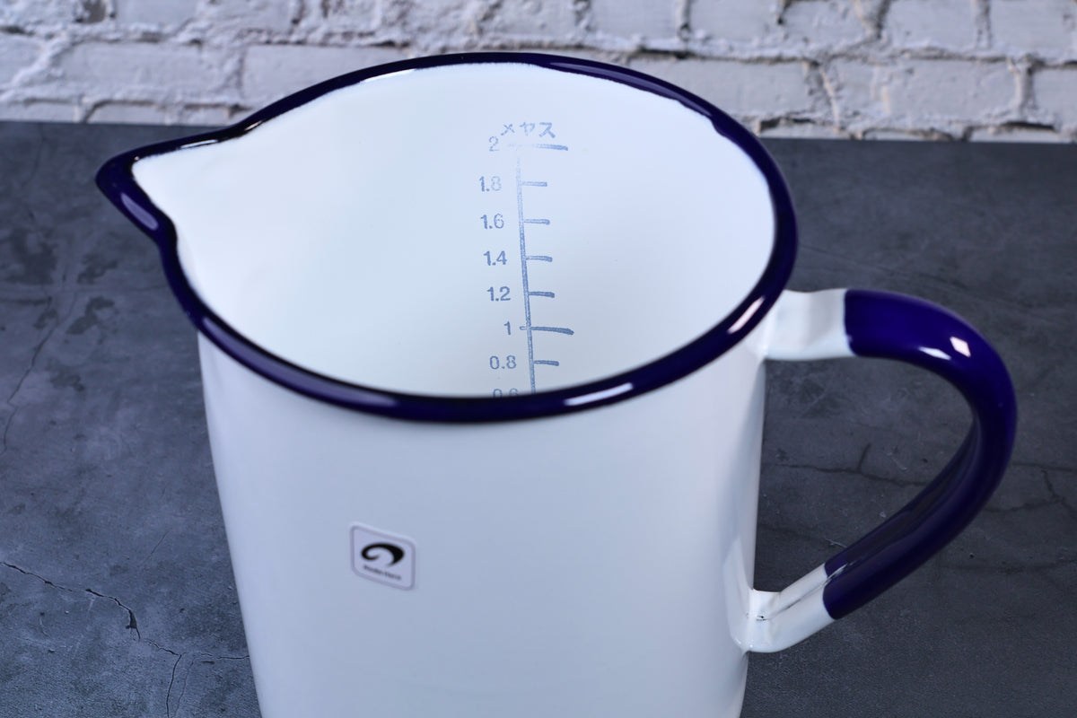 Noda Horo enamel measuring pitcher 2L — close-up of interior showing liter measurement scale markings