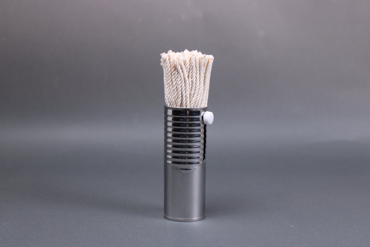 upright shot of metal housed cotton oil brush for pans takoyaki
