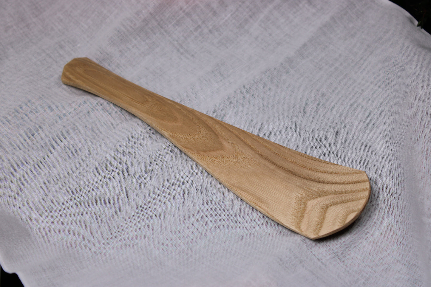 artisan crafted rice scoop made in japan by okubo house mokosho white towel in background