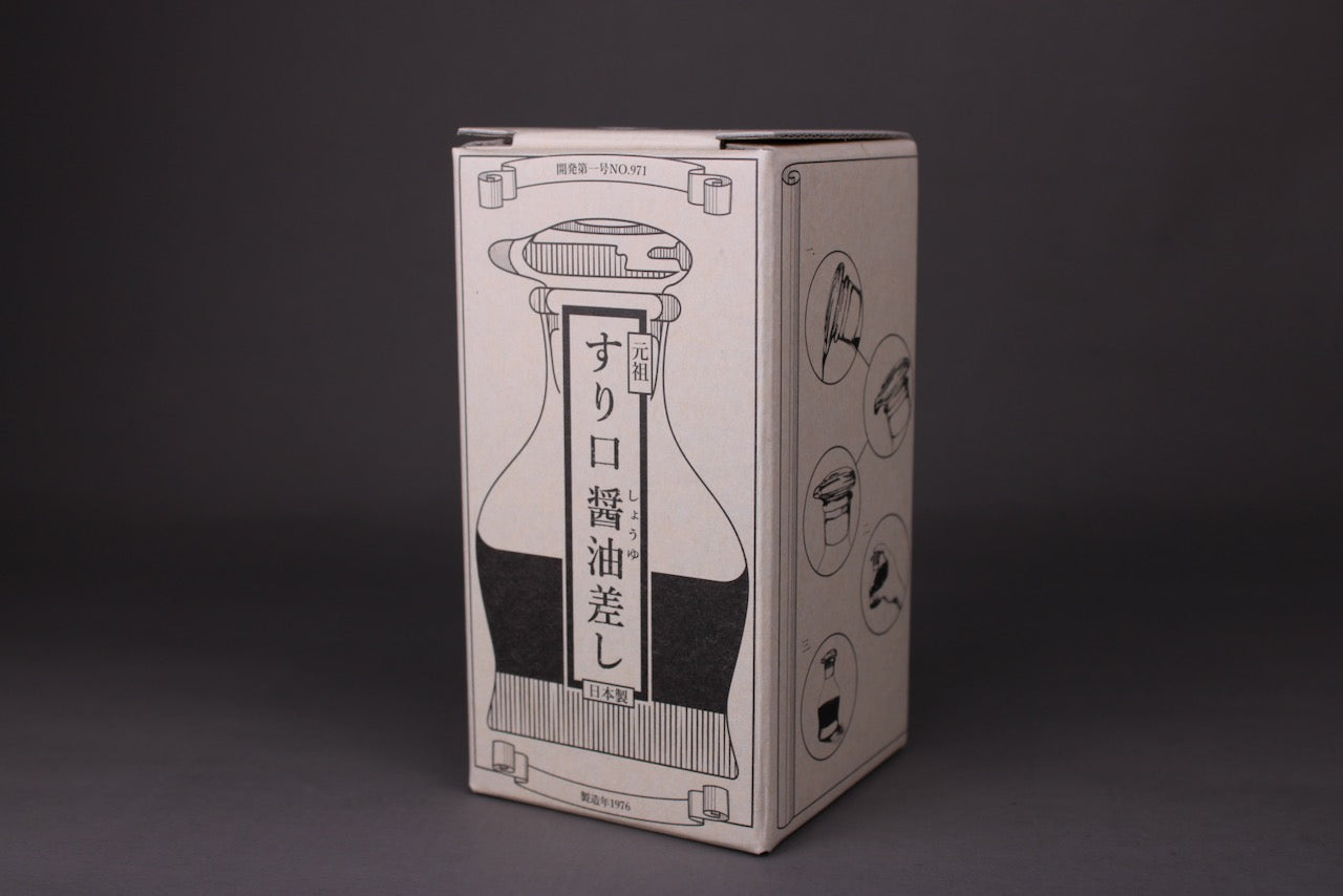 packaging box of hirota glass company soy sauce cruet with black kanji print and animation of dispenser with grey background
