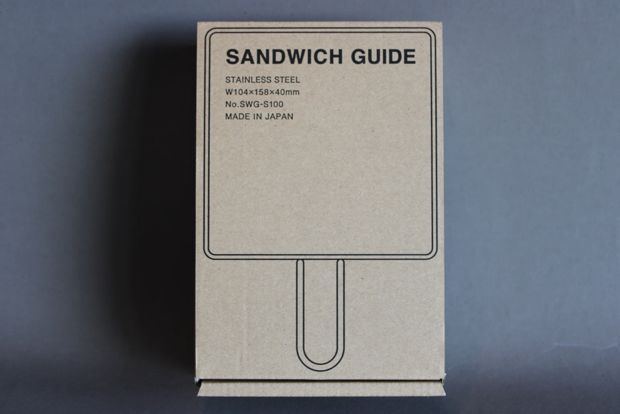 sandwich guide box showing black print of guide and text 