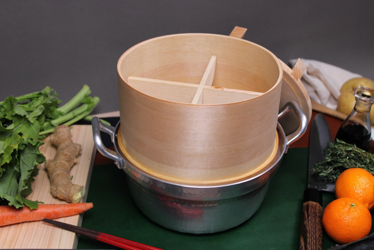closeup hinoki seiro steamer inside bamboo mat wood divider with dantsuki aluminum pot