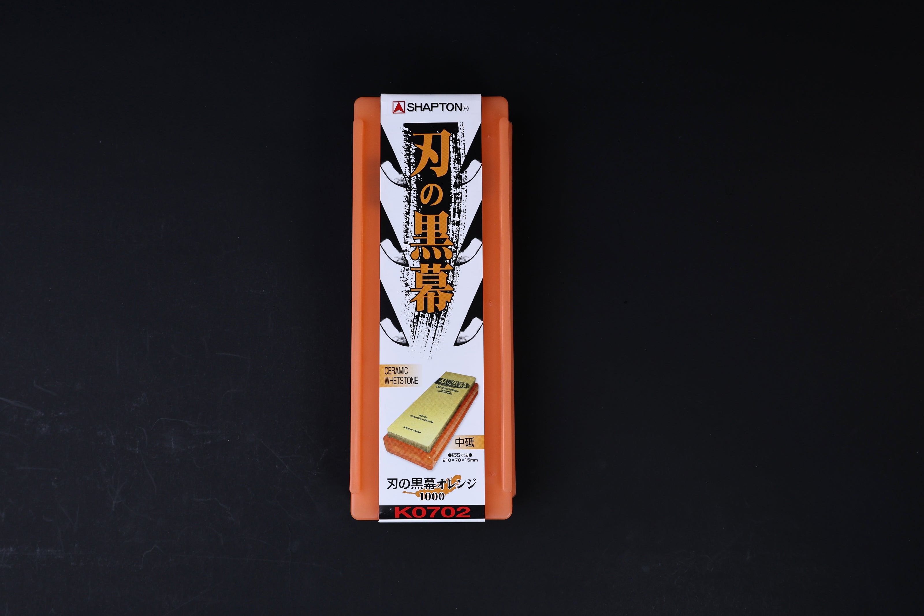 Shapton Kuromaku #1000 ceramic whetstone — orange storage case with Kuromaku label