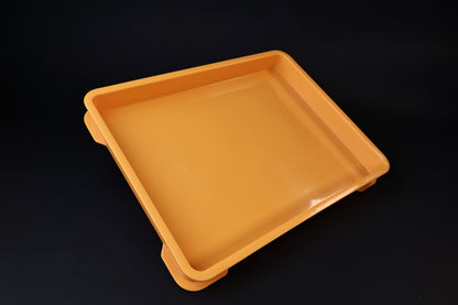 Sharpening Station Kit orange soaking tray, opposite angle showing side tabs and tray depth on black background